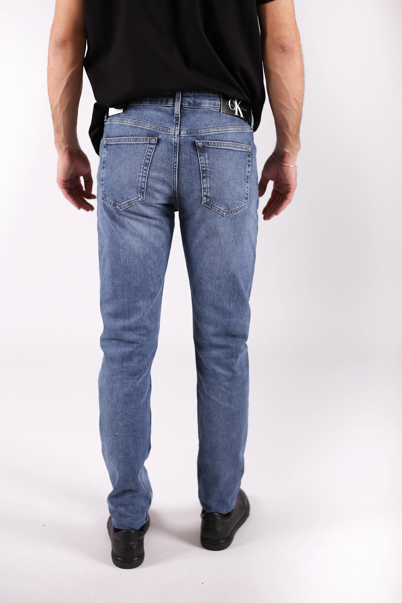Calvin klein slim taper jeans top